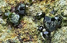 778 Gram Rare Terminated Deep Green Demantoid Garnet Crystals On matrix picture