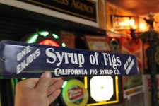 RARE 1950s BUY GENUINE SYRUP OF FIGS CALIFORNIA FIG STAMPED PAINTED METAL SIGN picture