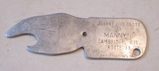 VTG JOHNNY AND BETTY AT MANNY'S CAMBRIDGE WISCONSIN SPIN YOU PAY BOTTLE Opener picture