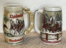 2x Budweiser Holiday Clydesdales Steins 1983-1984 Christmas-Anheuser Busch picture