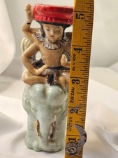 vintage wallpocket hindu indian figurine with four arms sitting on elephant picture