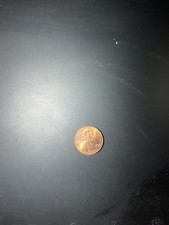 Gaffed penny to dime magic trick picture