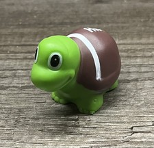 Turtle with a Football as it's Shell picture