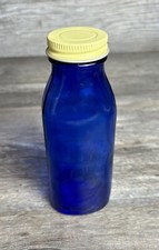 6” Cobalt Blue Medicine Bottle With Yellow Screw On Cap picture