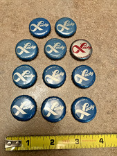 11 Vintage Lucky Lager Beer Bottle Caps Featuring Red Rebus Puzzles,  picture