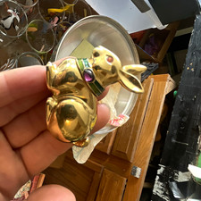 Vintage Estée Lauder golden rabbit solid perfume container, collectible picture