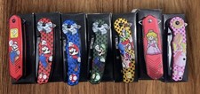 (7) Spring Assisted Video Game Pocket knife Wholesale Set Best Sellers picture