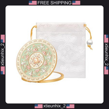 Vintage Compact Mirror with 2X Magnification and Cultural Design picture