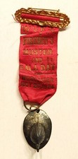 RARE W.V.F.A. FIREMAN'S MUSTER & GALA DAY JULY 26, 1924 RIBBON METAL HELMET PIN picture