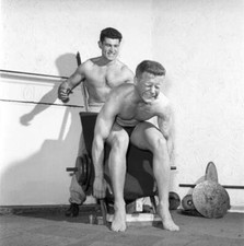 Body builder Larry Stevens seen here with his training coach- 1957 Old Photo 2 picture