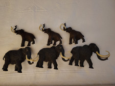 Six retired Carnegie / Safari wooly mammoths, 3 adult and 3 baby picture