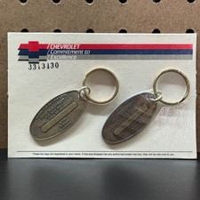 Chevrolet Commitment To Excellence 3313430 2 Keychains new in package Brass picture