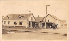 J38/ Wellston Michigan RPPC Postcard c1920s Swigart's Store Automobile 216 picture