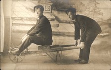 Trick Photography Double Exposure Man on Wheelbarrow c1910s RPPC Postcard bhn picture