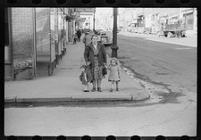 Photo:1930s Street Scene Woman and Children Sidewalk City View picture