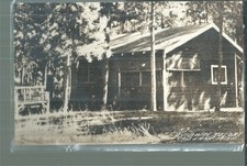 NICE RPPC VIEW OF A COTTAGE AT THE OJIBWAY RESORT ON CASS LAKE, MN picture