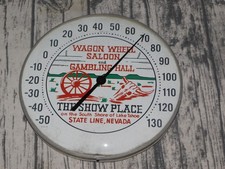 VTG WAGON WHEEL SALOON GAMBLING HALL THERMOMETER SIGN HARVEY'S LAKE TAHOE WORKS picture