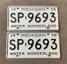 RARE 1958 MICHIGAN LICENSE PLATE PLATES PAIR ORIGINAL NEVER MOUNTED EDGE WEAR picture