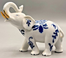 Porcelain Elephant Figurine – Blue Onion Pattern, Gold-Toned Tusks, 7 in picture