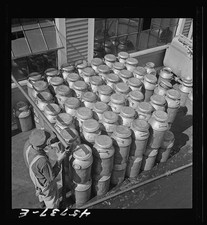 Photo:Milk cans at the United Farmers' cooperative creamery picture