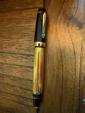 This pen is a Montblanc Meisterstück Bohème rollerball/ballpoint pen featuring a picture