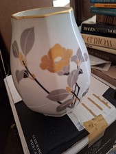 This piece is a vintage Okura Art China (OAC) white porcelain vase  picture