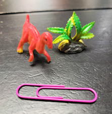 Plastic Dinosaur Figurine Plastic Toy Figure with Green Plant Accessory picture