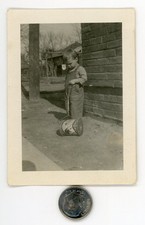 Old 1920's mini photo / Common Sense Farm Boy Can't Figure Out Purpose of Toy picture