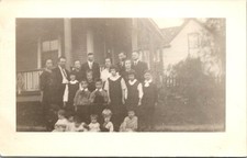 Group Family Photo In Front of Unidentified House c1930s RPPC Postcard picture
