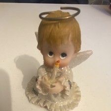 This image shows a vintage Enesco 