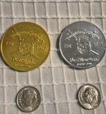 Disney PIRATES OF THE CARIBBEAN token Coin. SET OF TWO SILVER + GOLD 1967-1971  picture
