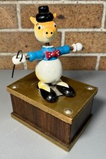 Vtg Painted wood circus pig music box coin bank spring arms head picture