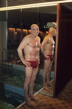 Telly Savalas at the swimming pool Los Angeles California United S- 1983 Photo 2 picture