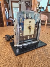 General Electric “Lotus” Art Deco electric clock, model 4F58 picture