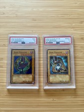 Yu-Gi-Oh Dark Magician 1st Edition 2004 + 2006 Dark Magician 1st Edition PSA picture