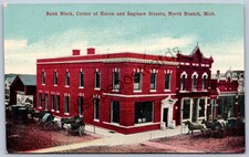 K51/ North Branch Michigan Postcard c1910 Bank Block Stores Wagons 164 picture