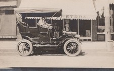 Will in His Brass Era Touring Car Drug Store Street 1909 - RPPC Photo Postcard picture
