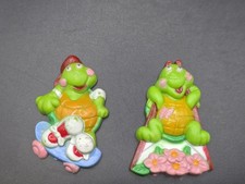 vintage 1980s blow mold plastic refrigerator magnets featuring colorful turtles picture