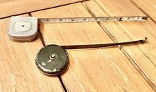 Vintage 2 Tape Measures Round Square￼ picture