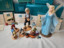 7 Piece WDCC Pinocchio Set with Boxes and COA picture