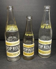 Vintage Pop Kola Soda Bottles Set of 3 ACL Yellow White Label Mid-Century Soda picture