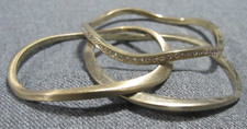 Vintage wavy goldtone metal bracelet bangles One with clear rhinestones picture