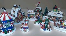 RARE- 8 pc Arctic Circle Christmas Village Buildings, carousel and figures.  picture