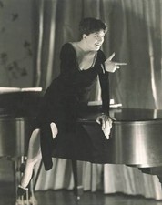 Singer Helen Morgan in a black dress with deep plunge sitting on 1930s Old Photo picture