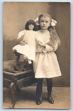 c1910's Child Girl With Doll Toy Studio RPPC Photo Antique Unposted Postcard picture