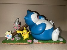 Pokemon Center Exclusive Slumbering Snorlax Bookends 2-Pc Pikachu and Timburr picture