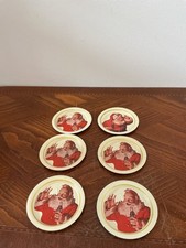 6-vintage Coca-Cola Santa Claus metal coasters from the early 1980s picture