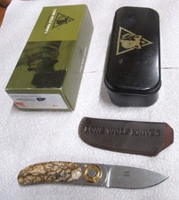 Paul Lone Wolf Pocket Knife  with Stone Handels 2003 ,With Tin  and pouch picture