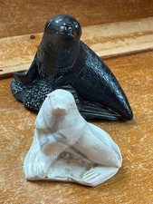 Lot of Carved Black of Cream & Gray Striped Soapstone Seal Figurine - black one picture