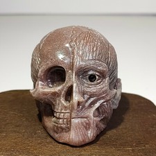Natural quartz, mineral raw stone, hand carving,Human face skull picture